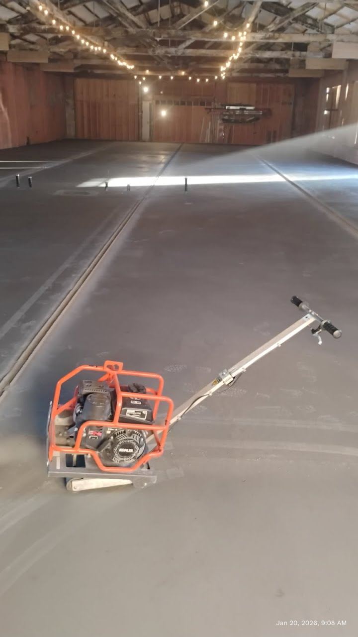 Power trowel on a large shop floor pour